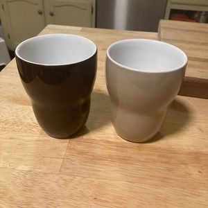 Two Starbucks double insulated cups